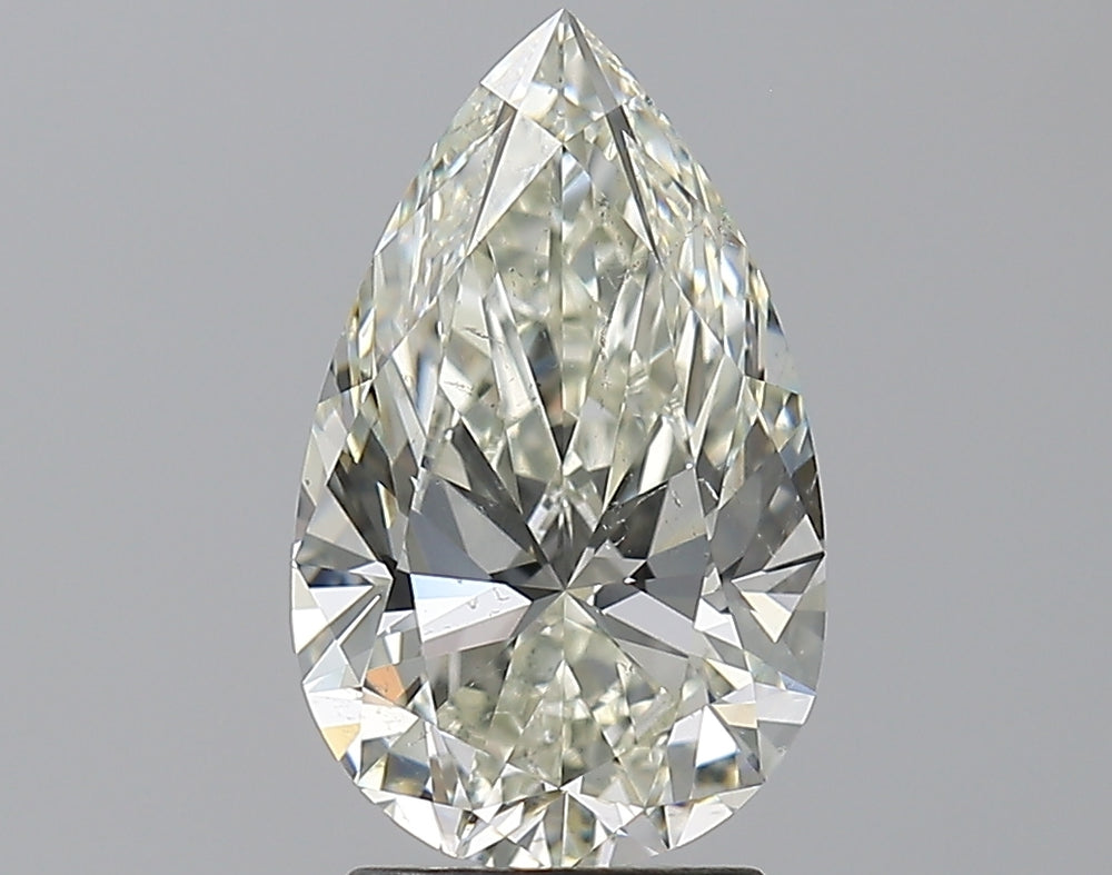 2.6 Carat Pear Natural Diamond with  Cut Diamond in 14KT  view 1
