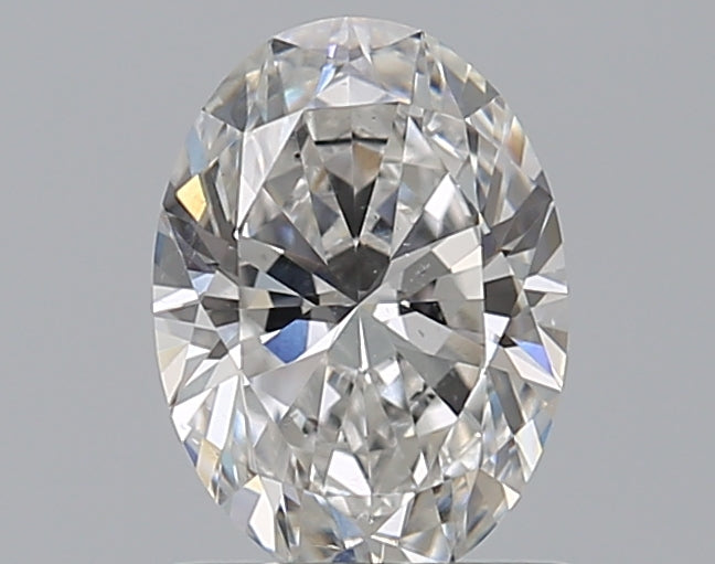 0.85 Carat Oval Natural Diamond with  Cut Diamond in 14KT  view 1
