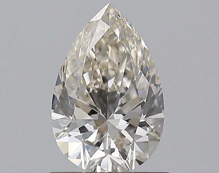0.84 Carat Pear Natural Diamond with  Cut Diamond in 14KT  view 1
