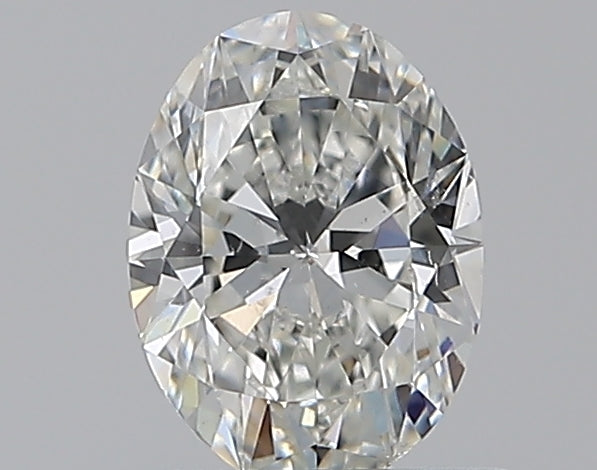 0.65 Carat Oval Natural Diamond with  Cut Diamond in 14KT  view 1
