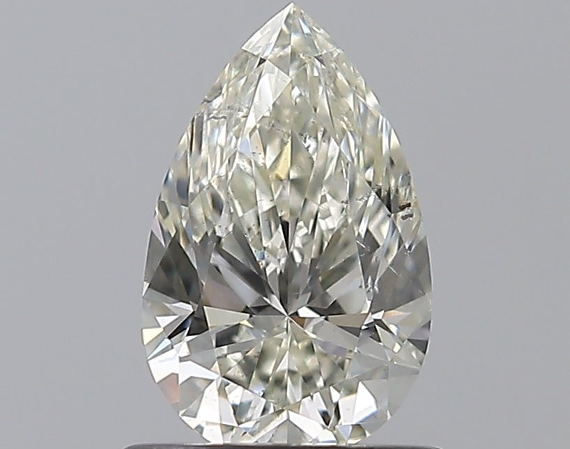0.81 Carat Pear Natural Diamond with  Cut Diamond in 14KT  view 1
