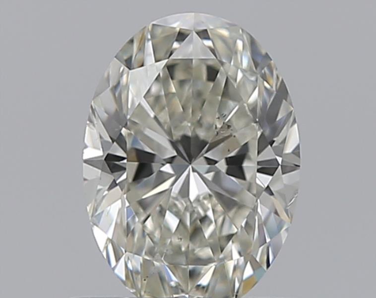 0.66 Carat Oval Natural Diamond with  Cut Diamond in 14KT  view 1
