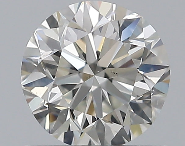 0.7 Carat Round Natural Diamond with  Cut Diamond in 14KT  view 1
