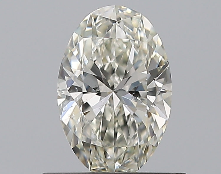 0.6 Carat Oval Natural Diamond with  Cut Diamond in 14KT  view 1
