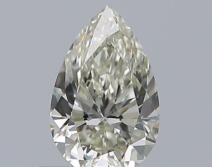 0.63 Carat Pear Natural Diamond with  Cut Diamond in 14KT  view 1

