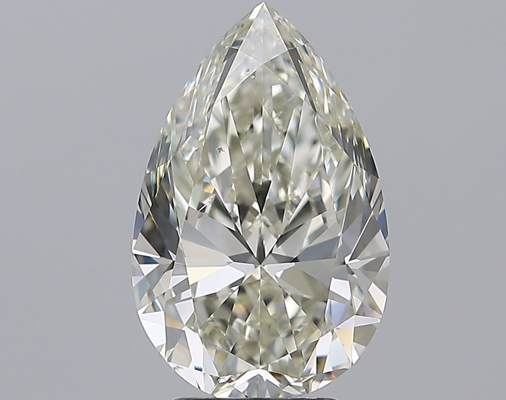 4.01 Carat Pear Natural Diamond with  Cut Diamond in 14KT  view 1
