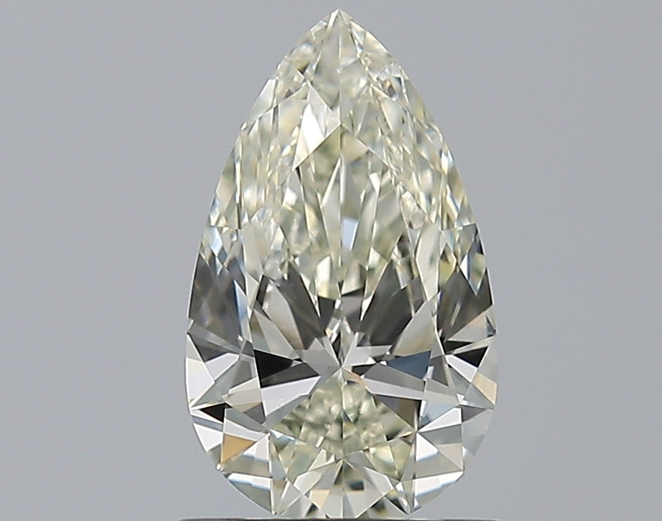 1.01 Carat Pear Natural Diamond with  Cut Diamond in 14KT  view 1
