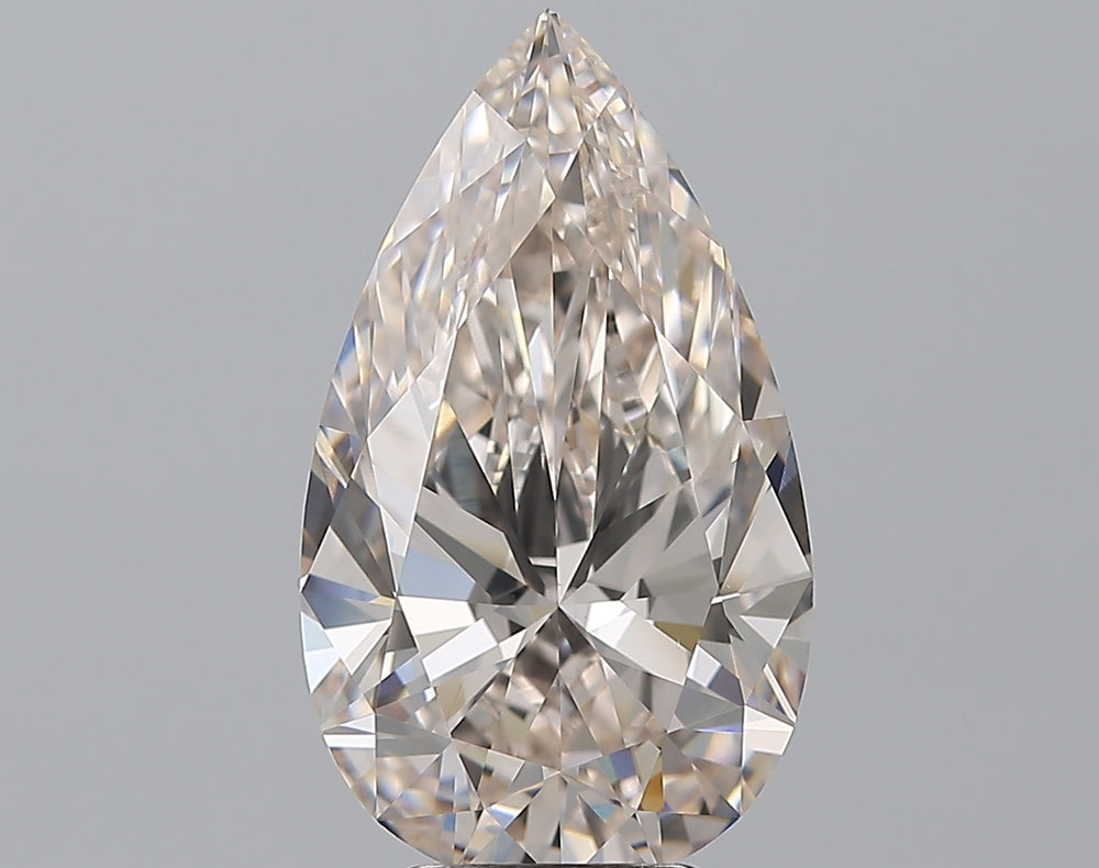 5.01 Carat Pear Natural Diamond with  Cut Diamond in 14KT  view 1
