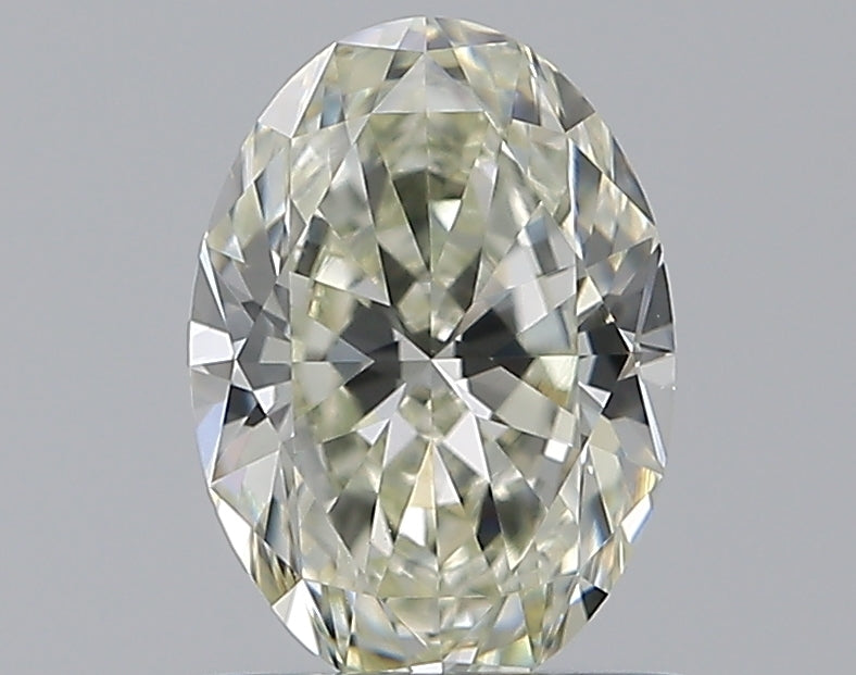 0.81 Carat Oval Natural Diamond with  Cut Diamond in 14KT  view 1
