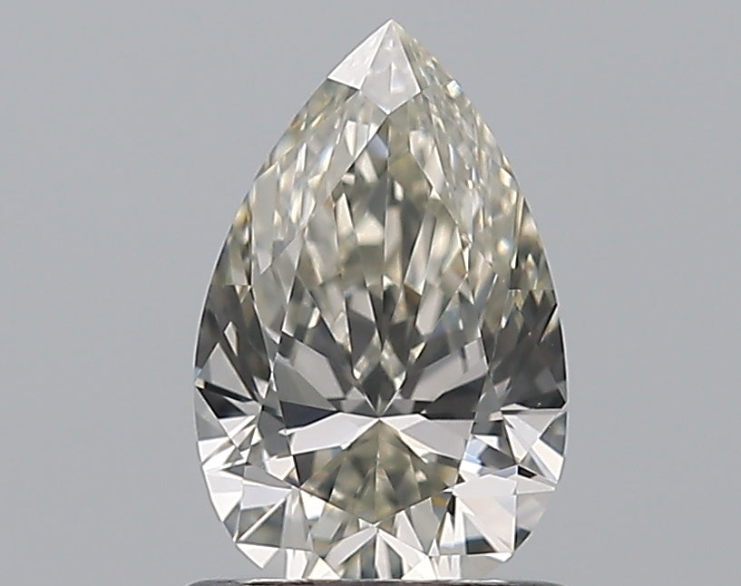 0.91 Carat Pear Natural Diamond with  Cut Diamond in 14KT  view 1
