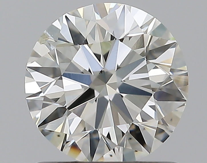 0.9 Carat Round Natural Diamond with  Cut Diamond in 14KT  view 1
