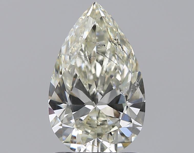 1.3 Carat Pear Natural Diamond with  Cut Diamond in 14KT  view 1
