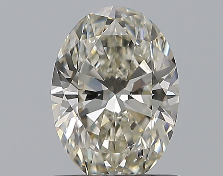 0.8 Carat Oval Natural Diamond with  Cut Diamond in 14KT  view 1
