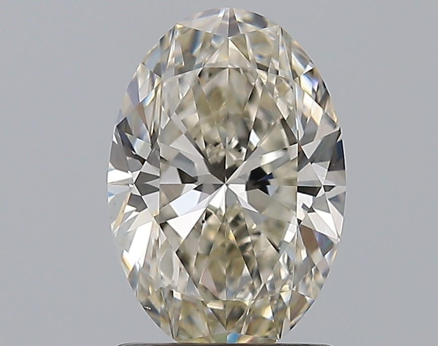 1.2 Carat Oval Natural Diamond with  Cut Diamond in 14KT  view 1
