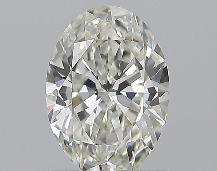 0.7 Carat Oval Natural Diamond with  Cut Diamond in 14KT  view 1
