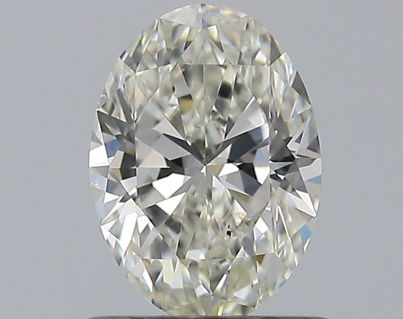 0.8 Carat Oval Natural Diamond with  Cut Diamond in 14KT  view 1
