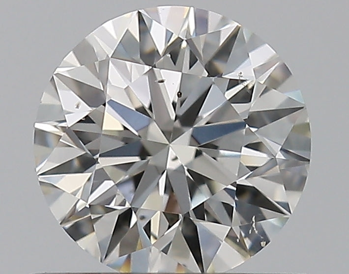 0.7 Carat Round Natural Diamond with  Cut Diamond in 14KT  view 1
