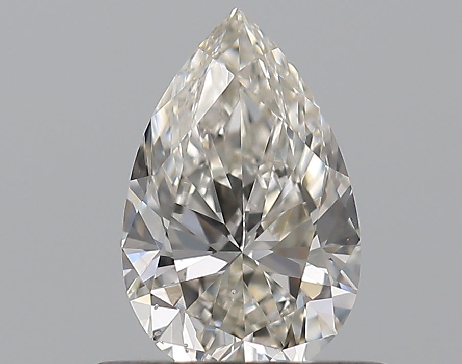 0.53 Carat Pear Natural Diamond with  Cut Diamond in 14KT  view 1

