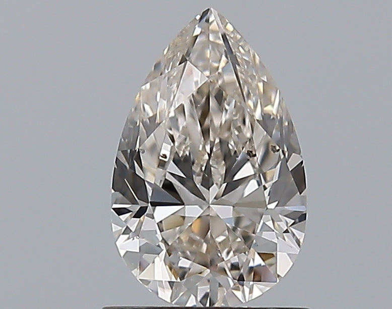 1.01 Carat Pear Natural Diamond with  Cut Diamond in 14KT  view 1
