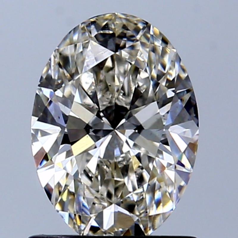 1.02 Carat Oval Natural Diamond with  Cut Diamond in 14KT  view 1
