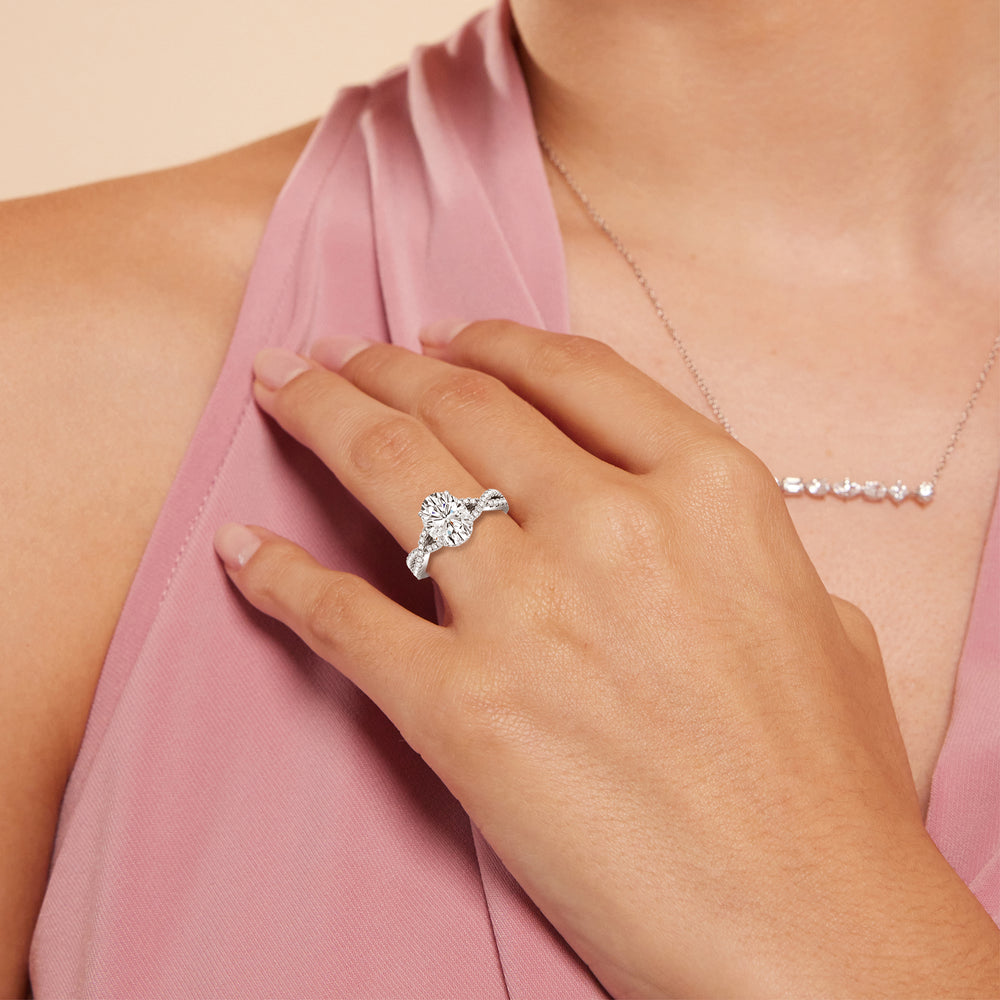 Model Wearing Twin Scalloped Hidden Halo Crossover Engagement Ring with Lab Grown Diamond view