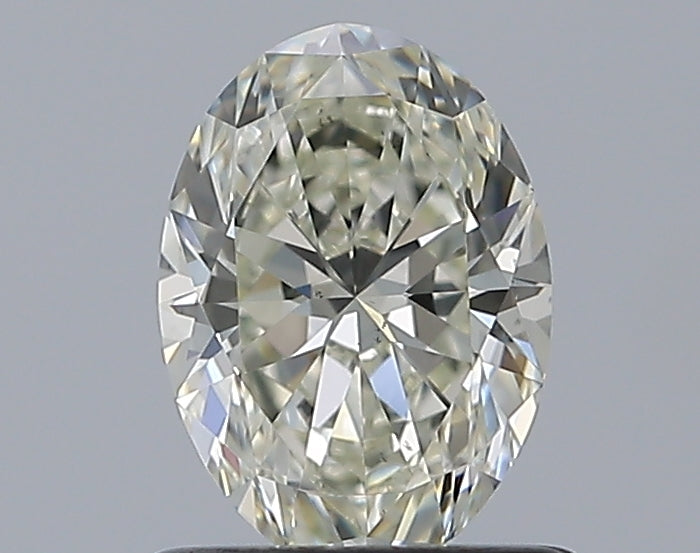 0.81 Carat Oval Natural Diamond with  Cut Diamond in 14KT  view 1
