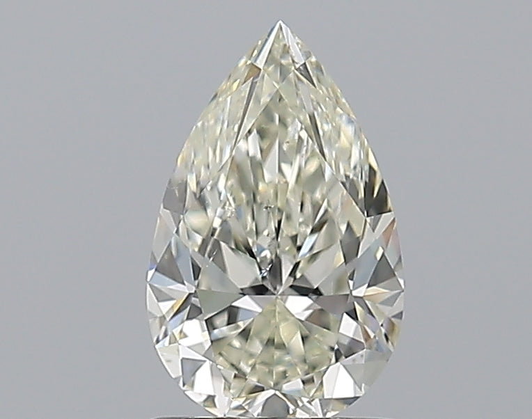 1.03 Carat Pear Natural Diamond with  Cut Diamond in 14KT  view 1
