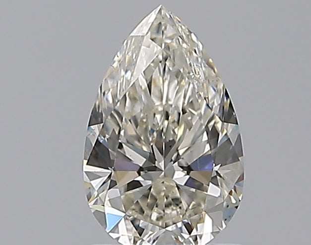 0.98 Carat Pear Natural Diamond with  Cut Diamond in 14KT  view 1
