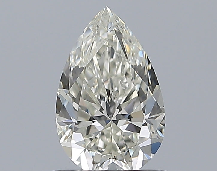 0.81 Carat Pear Natural Diamond with  Cut Diamond in 14KT  view 1
