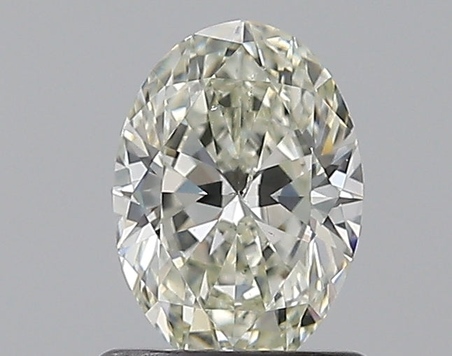 0.8 Carat Oval Natural Diamond with  Cut Diamond in 14KT  view 1
