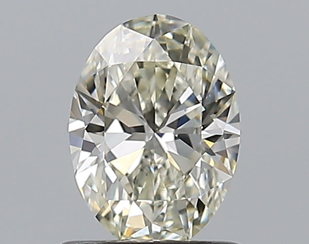 0.8 Carat Oval Natural Diamond with  Cut Diamond in 14KT  view 1
