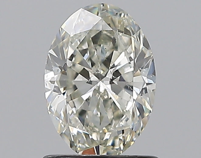0.99 Carat Oval Natural Diamond with  Cut Diamond in 14KT  view 1
