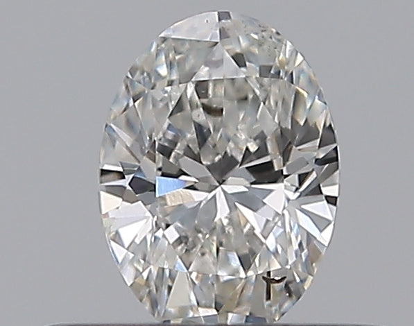 0.32 Carat Oval Natural Diamond with  Cut Diamond in 14KT  view 1
