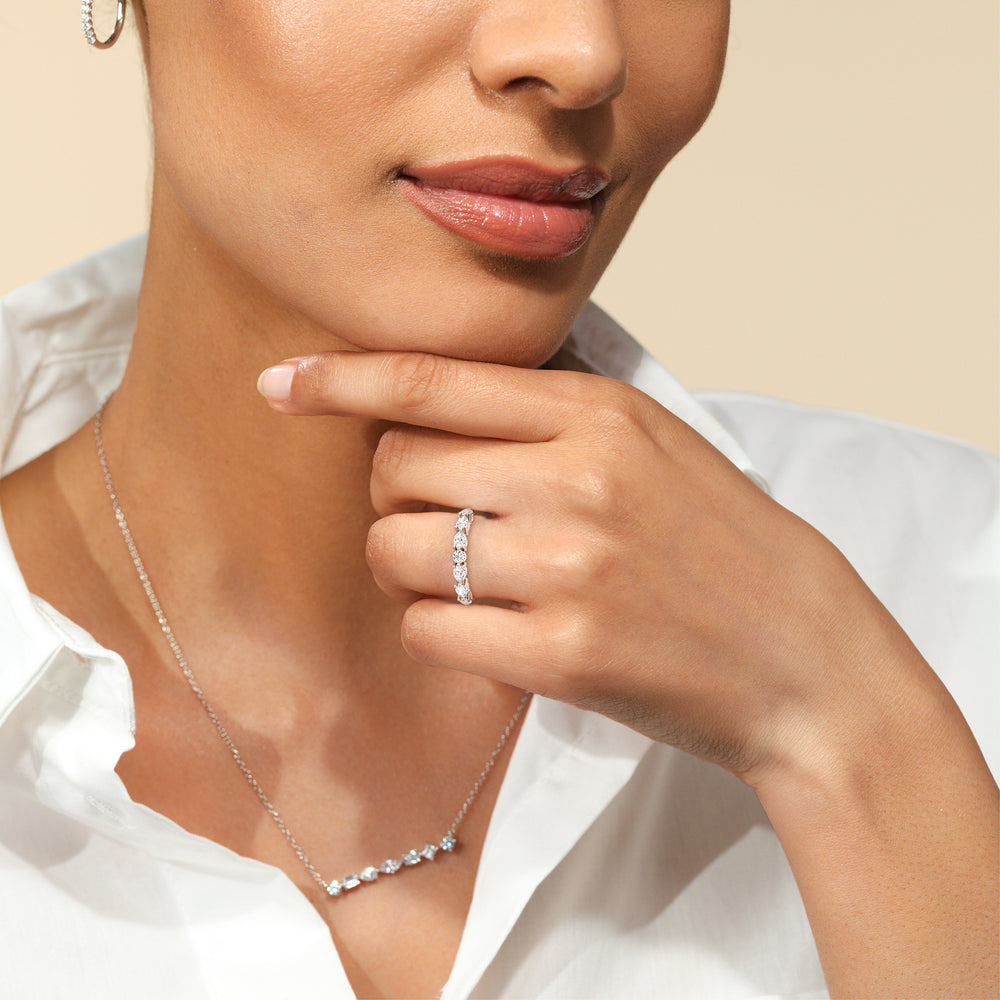 Model Wearing Glamorous Pear Side Stone Solitaire Diamond Wedding Band view