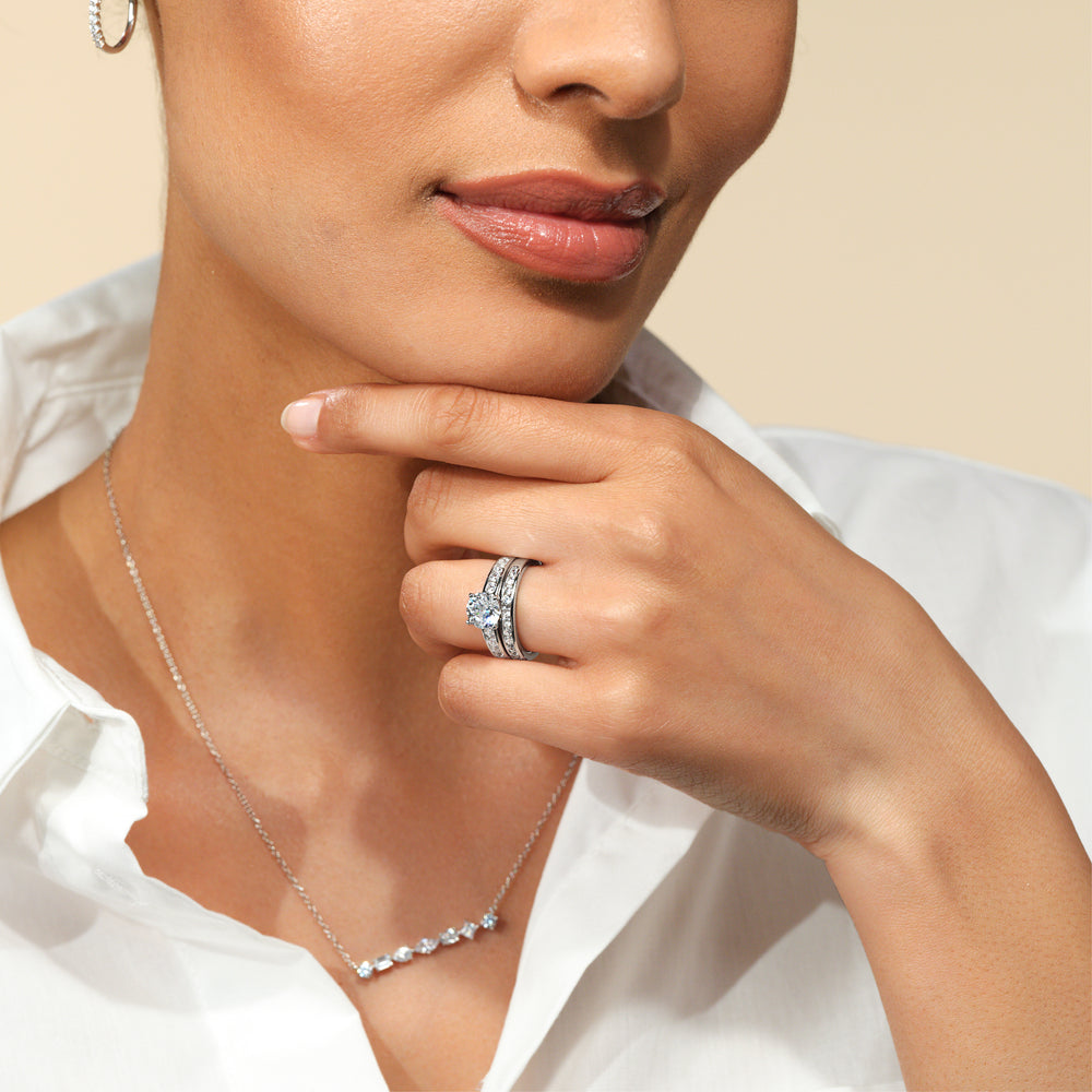 Model Wearing Six Prong Channel Set Solitaire Diamond Wedding Band view
