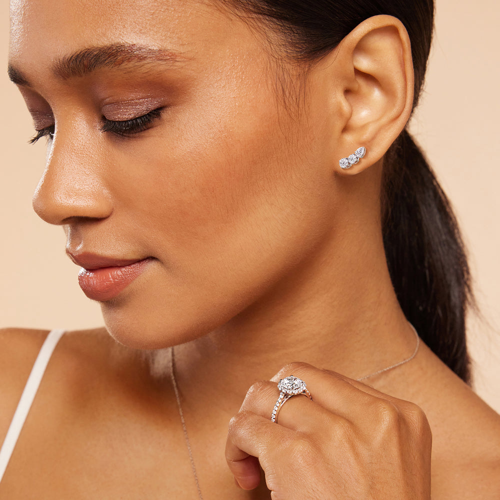 Model Wearing Trilogy Round and Pear Climber Earrings view