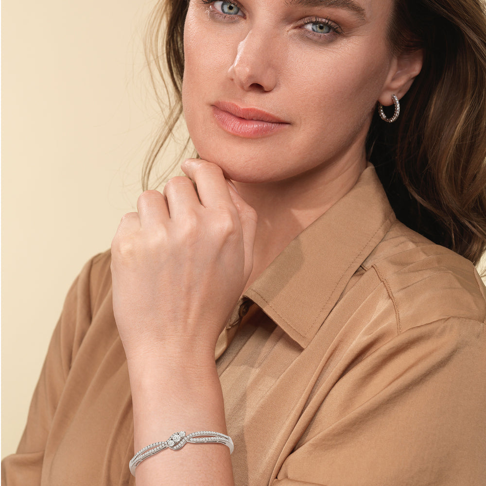 Model Wearing Three Stone Crossover Diamond Bangle view