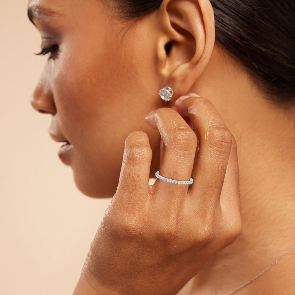 Model Wearing Cushion Cathedral Halo Diamond Wedding Band view