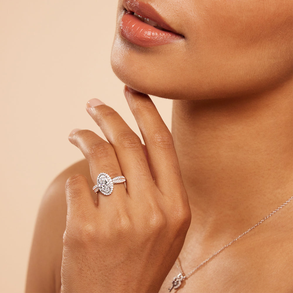 Model Wearing Vintage Oval Halo Engagement Ring (E+ VVS+) with Lab Grown Diamond view