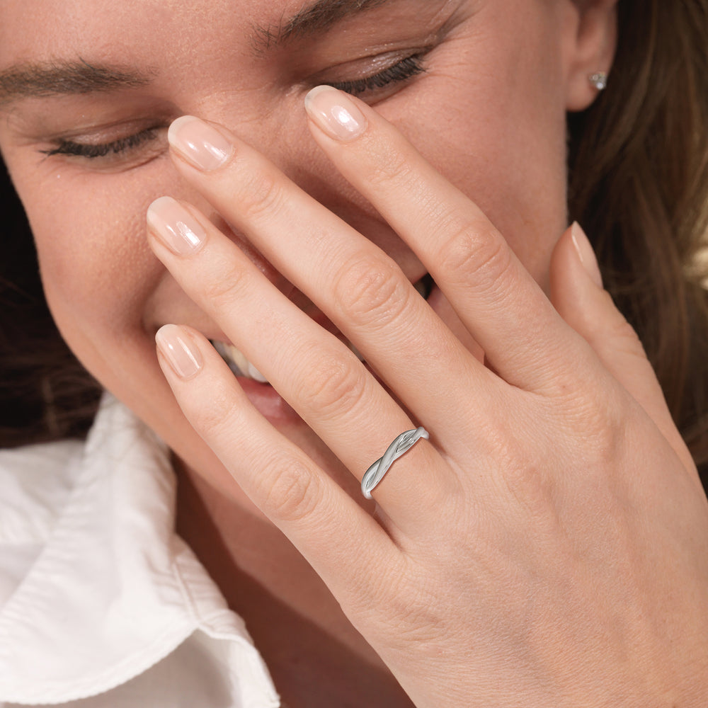 Model Wearing Twisting Solitaire Wedding Band view