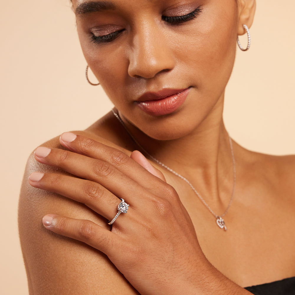 Model Wearing Channel Set Hidden Halo Engagement Ring view
