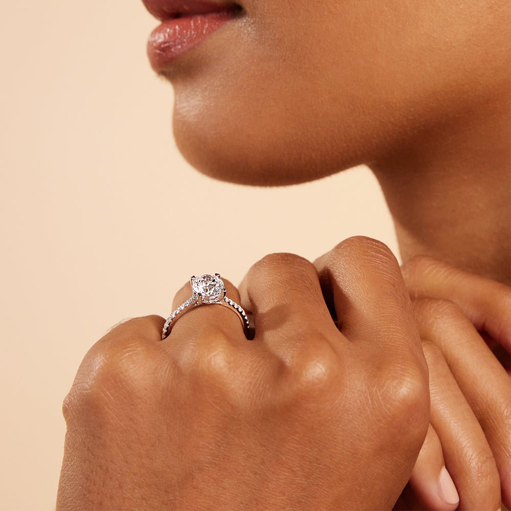 Model Wearing Channel Set Hidden Halo Engagement Ring view