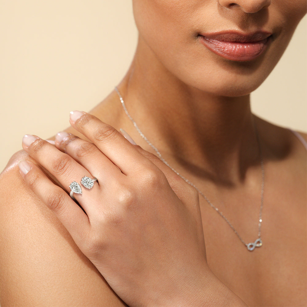 Model Wearing Diamond Curved Toi et Moi Engagement Ring with Lab Grown Diamond view