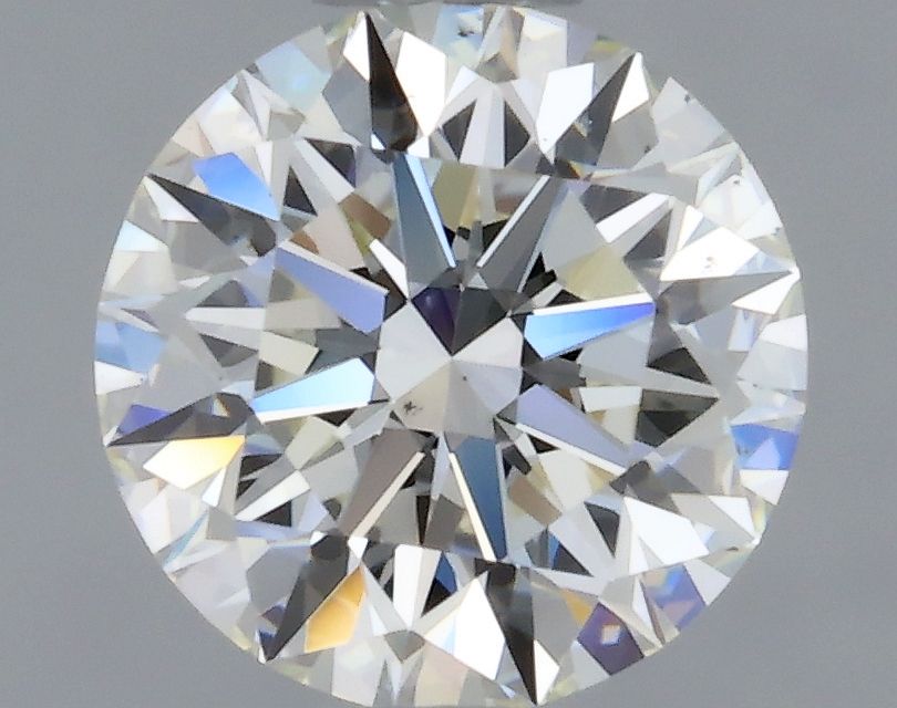0.6 Carat Round Natural Diamond with  Cut Diamond in 14KT  view 1
