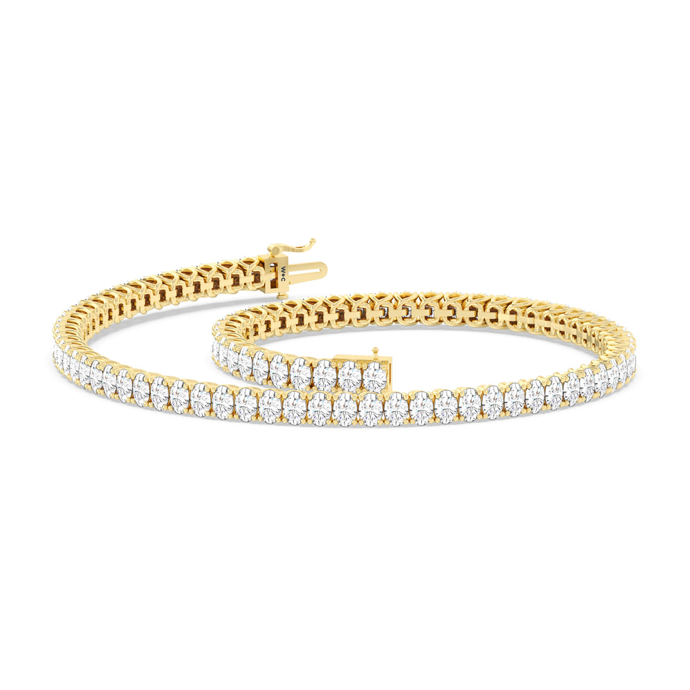 Oval Tennis Bracelet with 3 Cut Diamond in 14KT Yellow Gold view 5
