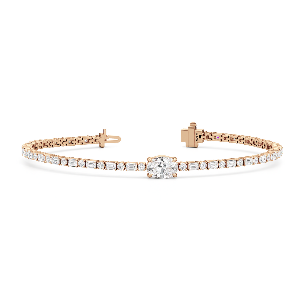 Oval with Trailing Round and Emeralds Tennis Bracelet with Lab Cut Diamond in 14KT Rose Gold view 2
