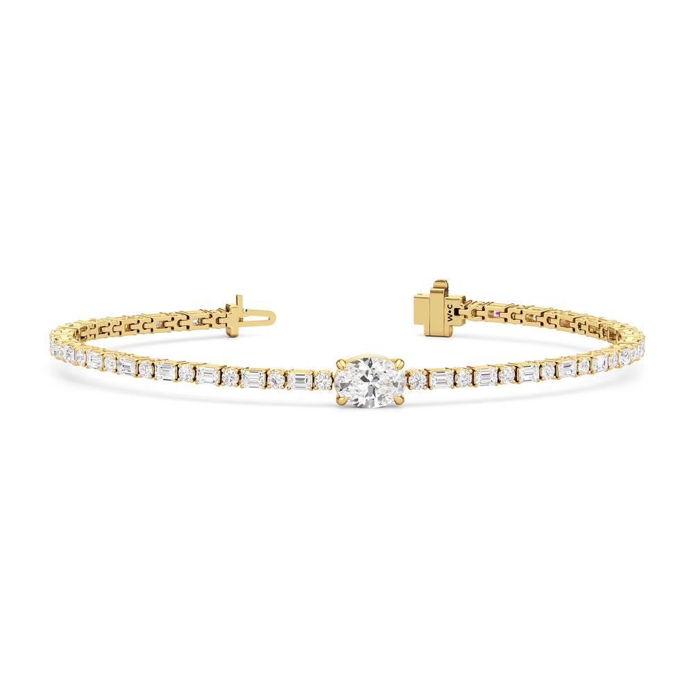 Oval with Trailing Round and Emeralds Tennis Bracelet with Lab Cut Diamond in 14KT Yellow Gold view 2
