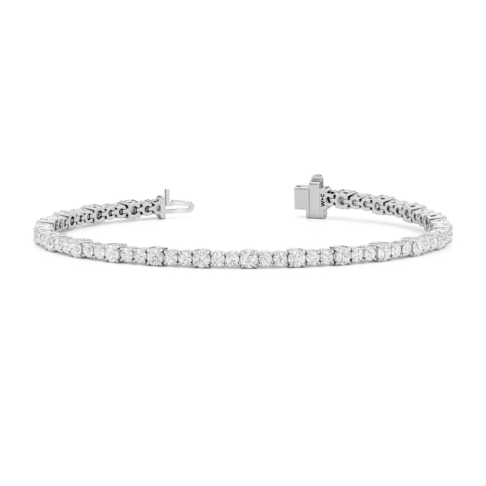 Round Sequenced Tennis Bracelet with 4 Cut Diamond in 14KT White Gold view 2
