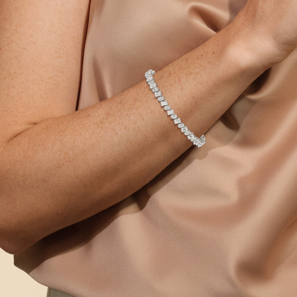 Oval and Emerald Herringbone Tennis Bracelet with 13 Cut Diamond in 14KT White Gold view 4
