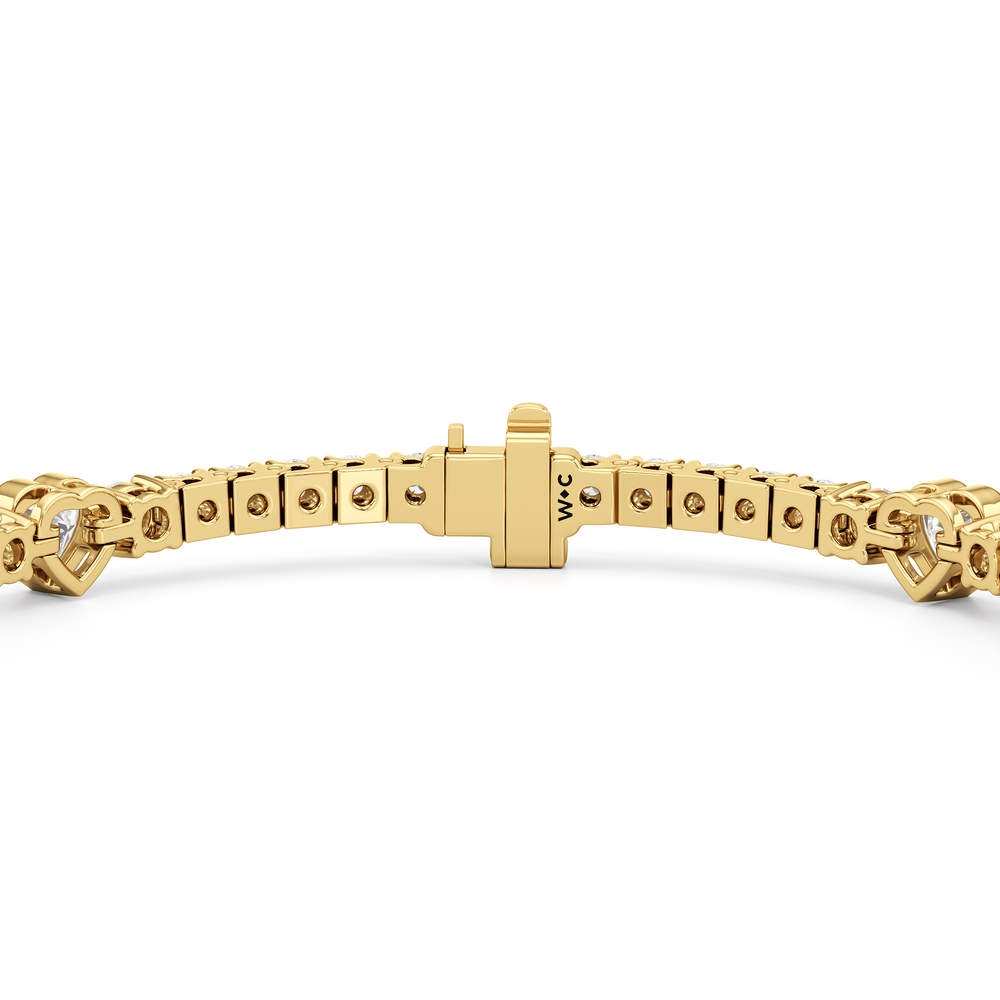 Bezeled Heart Station with Round Diamonds Tennis Bracelet with 4 Cut Diamond in 14KT Yellow Gold view 7
